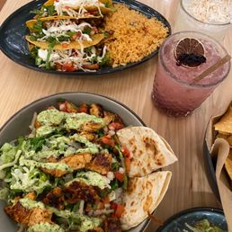 Agave Azul Kirkman signature dishes Cali Rice BowlTacos Al PastorBirria BrisketGuajillo Citrus Chicken Tacos